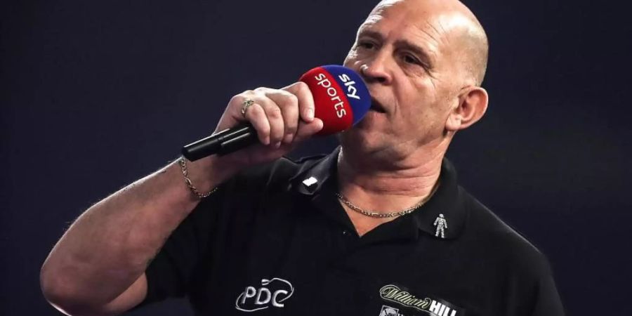 Die Stimme des Darts-Sports: Caller Russ Bray. Foto: Kieran Cleeves/PA Wire/dpa