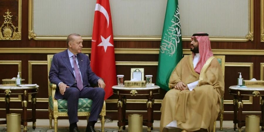 Pictures published by Turkish state media showed separate sit-downs with King Salman and his son