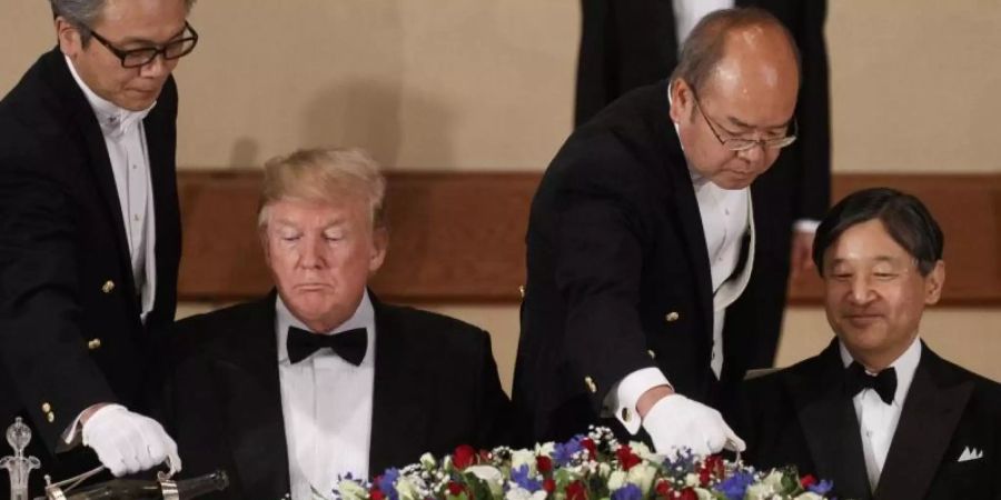 Donald Trump und Kaiser Naruhito von Japan während des Staatsbanketts im Kaiserpalast. Foto: Evan Vucci/AP