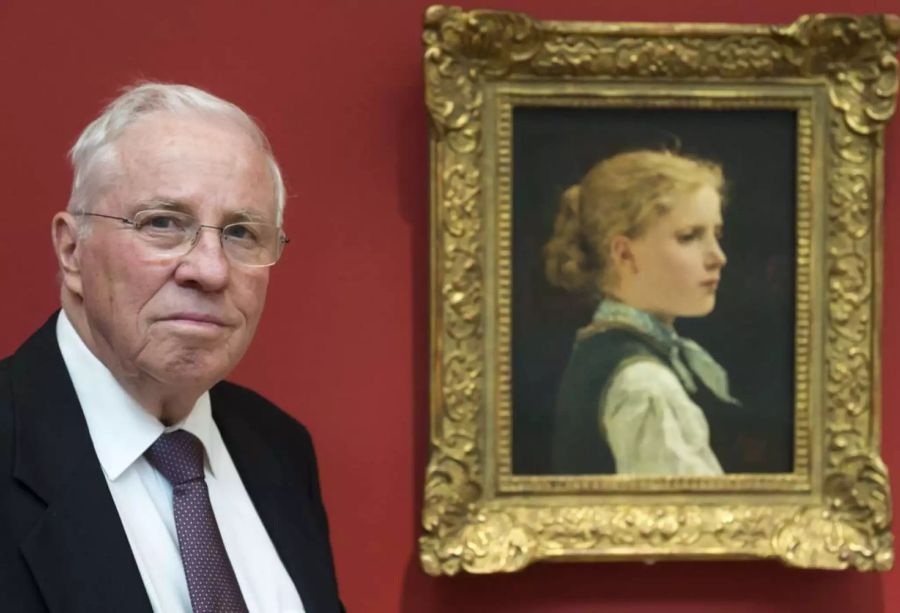 Christoph Blocher mit einem Bild des Schweizer Malers Albert Anker.