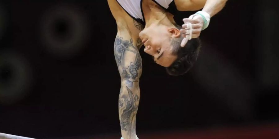 Marcel Nguyen kam mit 82,864 Punkten beim Turn-Weltcup in Stuttgart auf den vierten Rang. Foto: Vadim Ghirda/AP