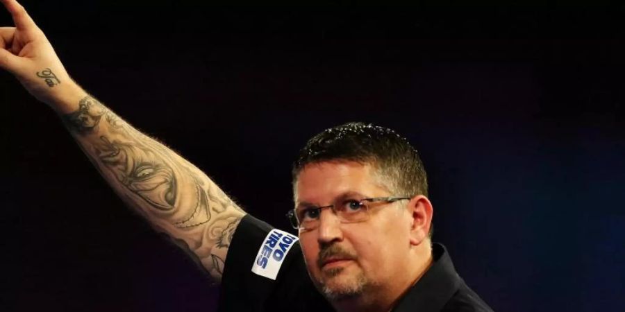 Doppel-Weltmeister Gary Anderson startet am heutigen Montag mit der Partie gegen den Nordiren Dolan in die Darts-WM. Foto: Steven Paston/PA Wire