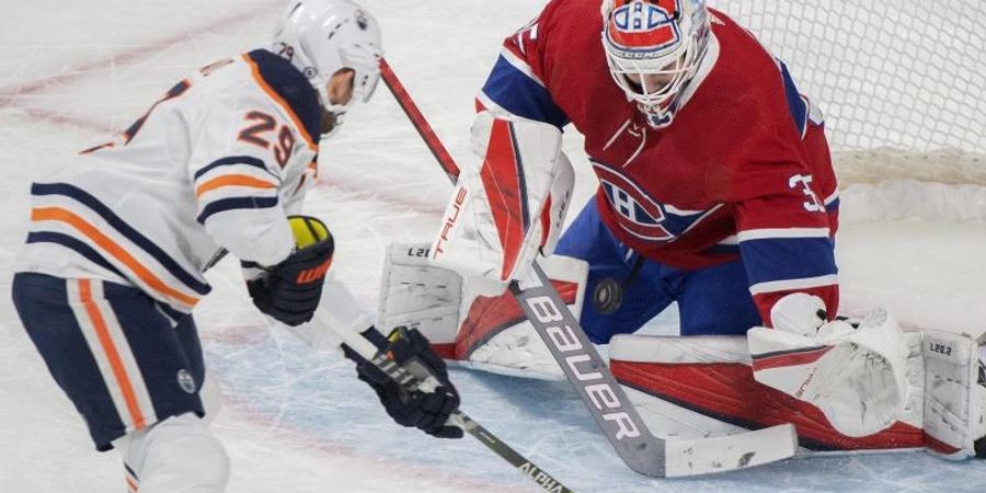 Für Leon Draisaitl (l) lief es gegen die Montreal Canadiens besonders gut. Foto: Graham Hughes/The Canadian Press via AP/dpa
