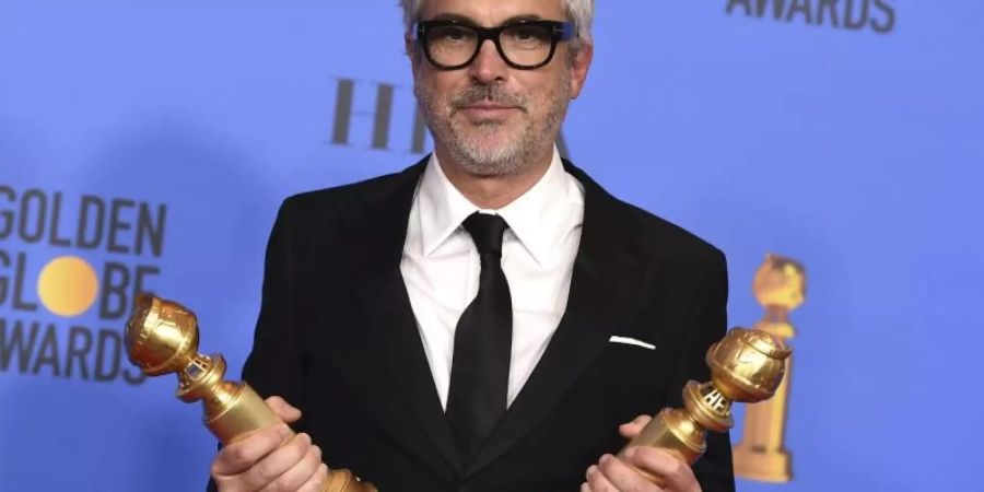 Bei der Verleihung der Golden Globes hat Alfonso Cuarón bereits zwei Trophäen gewonnen. Foto: Jordan Strauss/Invision/AP