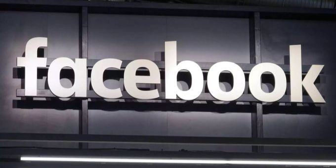 Das Logo des Internetunternehmens Facebook prangt in gewohnt weisser Farbe an einer grauen Wand. Facebook diem