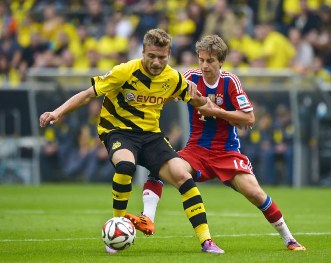 Ciro Immobile 2014 im Dress des BVB – gegen Bayern Münchens Gianluca Gaudino (heute bei YB). BVB