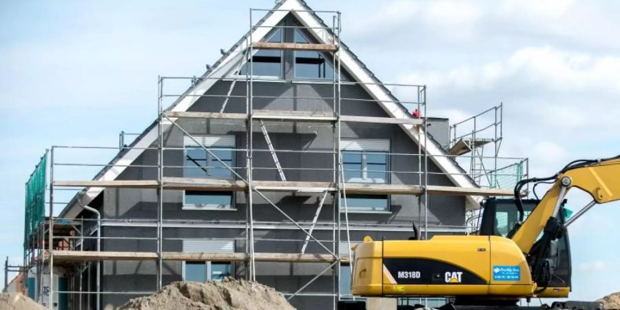 Das staatliche Baukindergeld wird stärker für den Bau von Eigenheimen nachgefragt. Foto: Hauke-Christian Dittrich/dpa