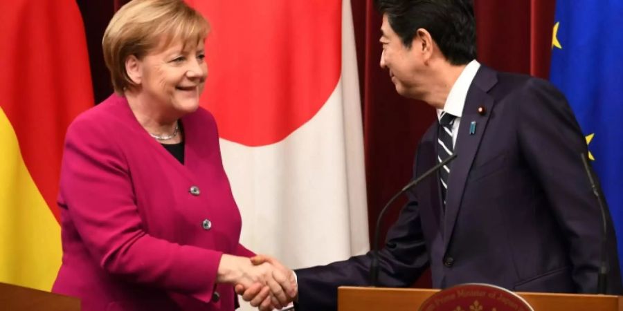 Bundeskanzlerin Merkel und Japans Regierungschef Abe