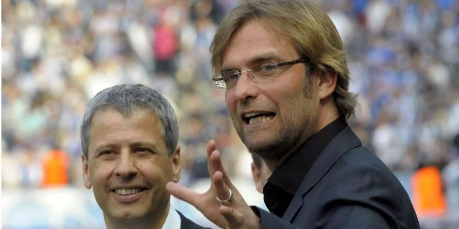 Lucien Favre (links, damals Hertha-Trainer) mit seinem Kollegen Jürgen Klopp.