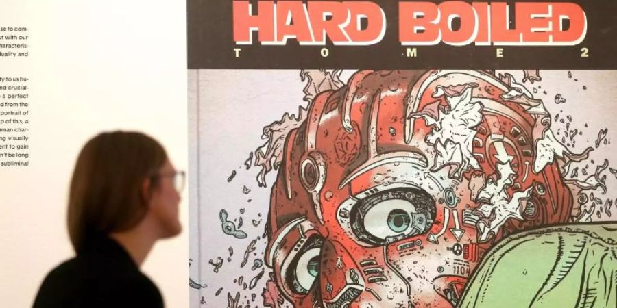 Die Reproduktion "Hard Boiled" von Geoff Darrow und Frank Miller im Museum Folkwang. Foto: Roland Weihrauch/dpa