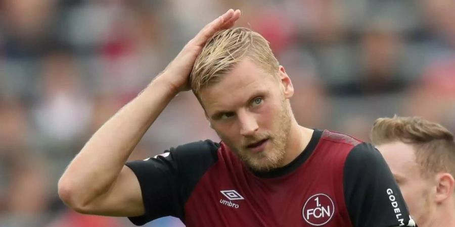 Nürnbergs Kapitän Hanno Behrens. Der «Club» wartet weiterhin auf den ersten Heimsieg seit dem 25. August. Foto: Daniel Karmann/dpa