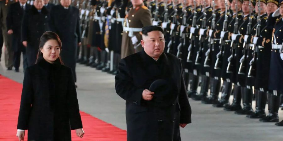 Kim Jong Un und seine Frau.