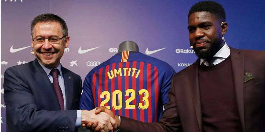 Bei Barcelona hat Umtiti (rechts) erst gerade seinen Vertrag verlängert.