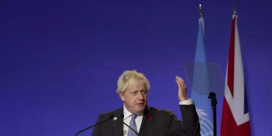 «Es ist eine Minute vor Mitternacht auf der Uhr des Weltuntergangs», sagte der britische Premierminister Boris Johnson zum Auftakt des UN-Klimagipfels COP26. Foto: Alberto Pezzali/AP/dpa