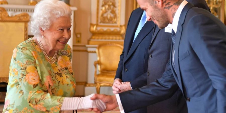 David Beckham bei einem Treffen mit der Queen 2018.