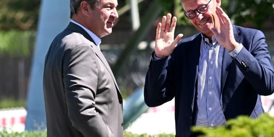Söder (l.)und Merz
