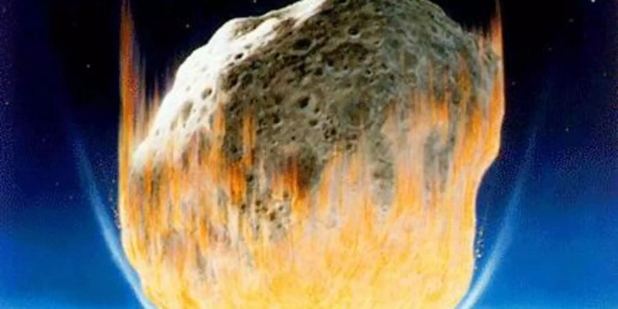 Dies ist die künstlerische Interpretation eines Asteroidenaufpralls auf der Erde. Der Asteroid im Bild erscheint viel grösser als der rund zehn Kilometer lange Felsen, von dem Wissenschaftler annehmen, dass er vor 66 Millionen Jahren auf der Erde aufschlug. Das Bild illustriert jedoch gut die Hitzeentwicklung beim Aufschlag des Asteroiden. Foto: Don Davis/NASA/dpa