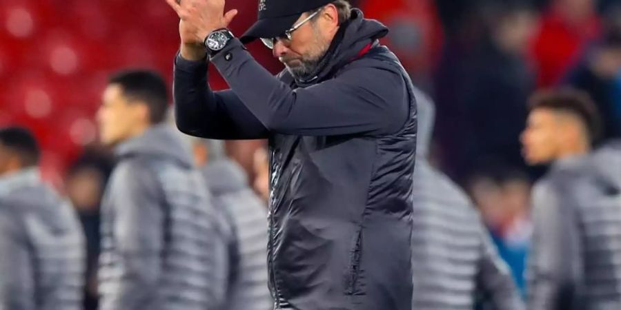 Liverpools Trainer Jürgen Klopp applaudiert nach dem Sieg über den FC Porto. Foto: Peter Byrne/PA Wire/dpa