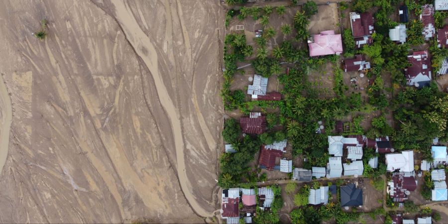 Aftermath of floods and landslides that killed hundreds people in Sumatra