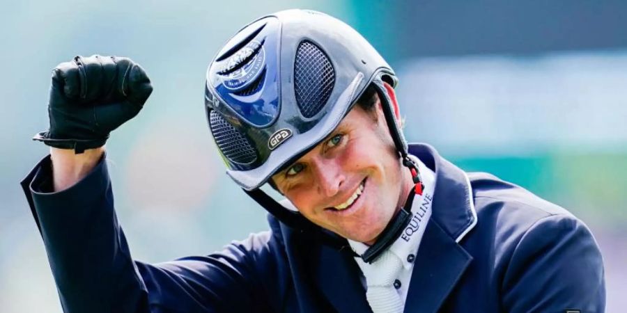 Hat auf der Global Champions Tour in Monaco den Grossen Preis gewonnen: Der irische Springreiter Darragh Kenny. Foto: Uwe Anspach/dpa