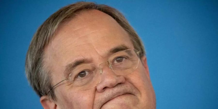 Armin Laschet hat sich für seinen Lacher in Flutgebiet entschuldigt. Foto: Michael Kappeler/dpa