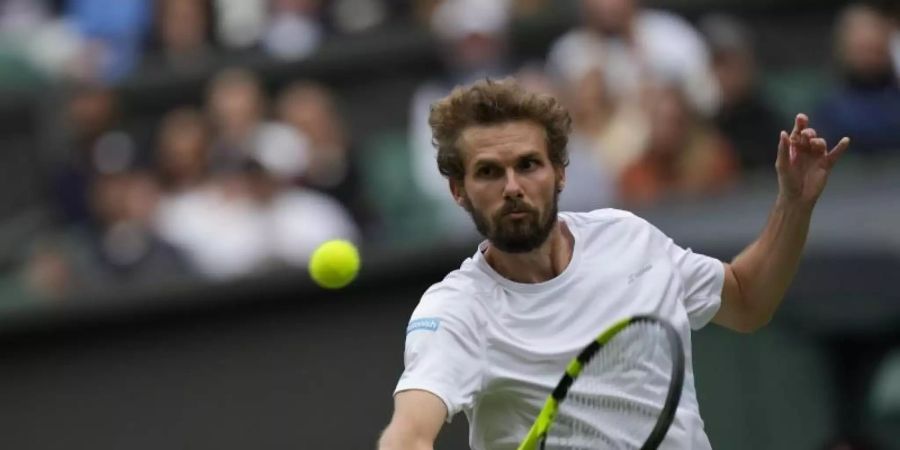 Oscar Otte beim Spiel gegen Andy Murray in Aktion. Foto: Alastair Grant/AP/dpa