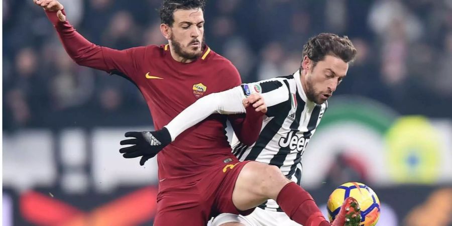 Claudio Marchisio (rechts) wehrt sich gegen Alessandro Florenzi.