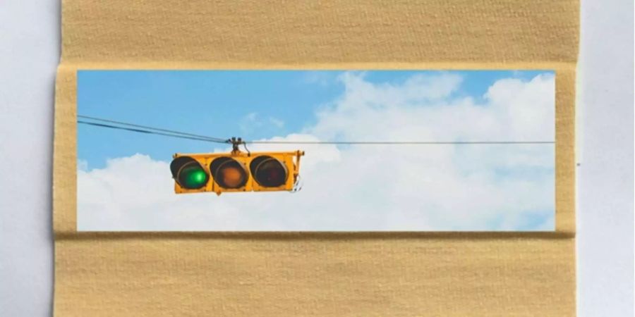 Eine Fotomontage veröffentlicht von Empa: Ein Pflaster mit einem Bild einer auf grün gestellten Ampel.