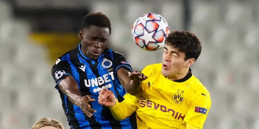 Neuzugang bei Bayer Leverkusen: Odilon Kossounou (l). Foto: Bruno Fahy/BELGA/dpa