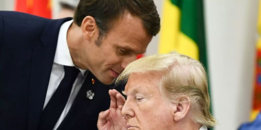 Macron und Trump bei einem Gipfeltreffen in Japan