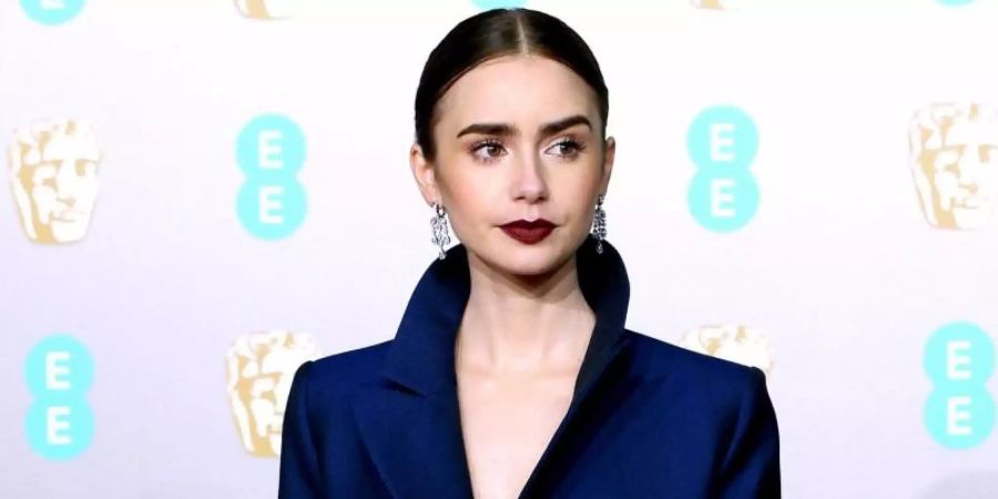 Schauspielerin Lily Collins bei der 72. BAFTA Preisverleihung in der Royal Albert Hall. Foto: Jonathan Brady/PA Wire/dpa