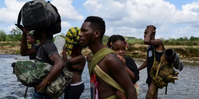 Migranten an der Grenze zwischen Kolumbien und Panama Migranten an der Grenze zwischen Kolumbien und Panama