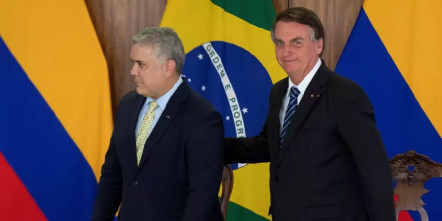 Brasiliens Präsident Jair Bolsonaro und sein kolumbianischer Amtskollege  Ivan Duque wollen am Weltklima-Gipfel in Glasgow auf die Souveränität im Amazonsgebiet pochen.