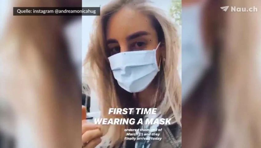 andrea-monica-hug-tragt-eine-maske