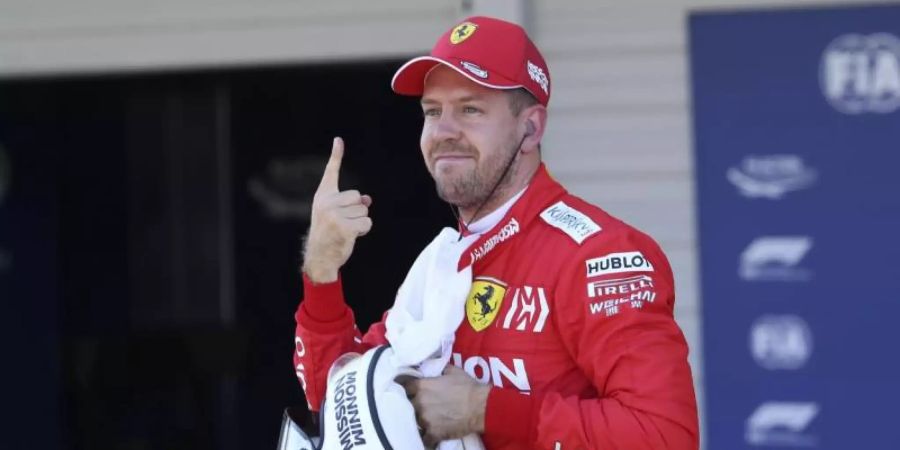 Startet in Suzuka von Platz eins: Ferrari-Pilot Sebastian Vettel. Foto: Toru Takahashi/AP/dpa