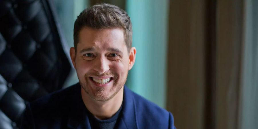 Jazzsänger Michael Bublé lächelt verschmitzt.