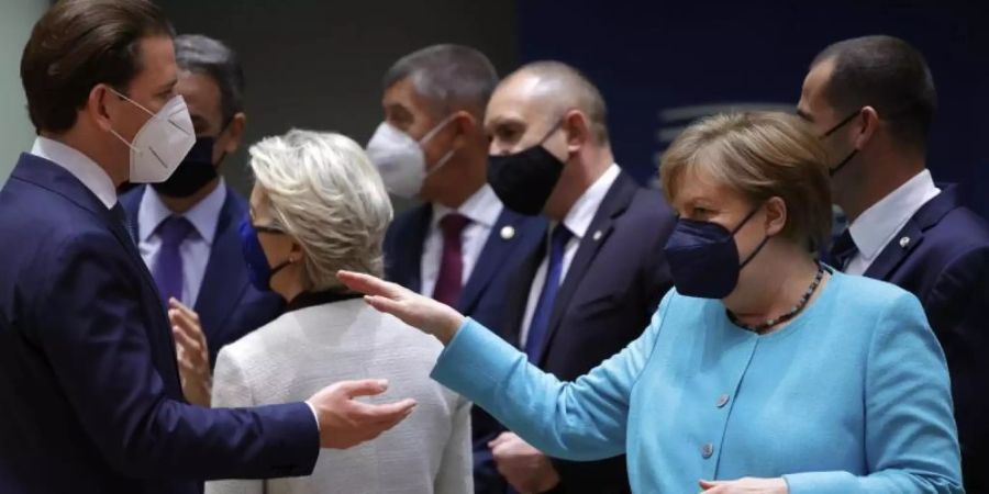 Bundeskanzlerin Angela Merkel beim Brüsseler Gipfel mit den Staats- und Regierungschefs und der EU-Spitze. Foto: Olivier Matthys/Pool AP/dpa