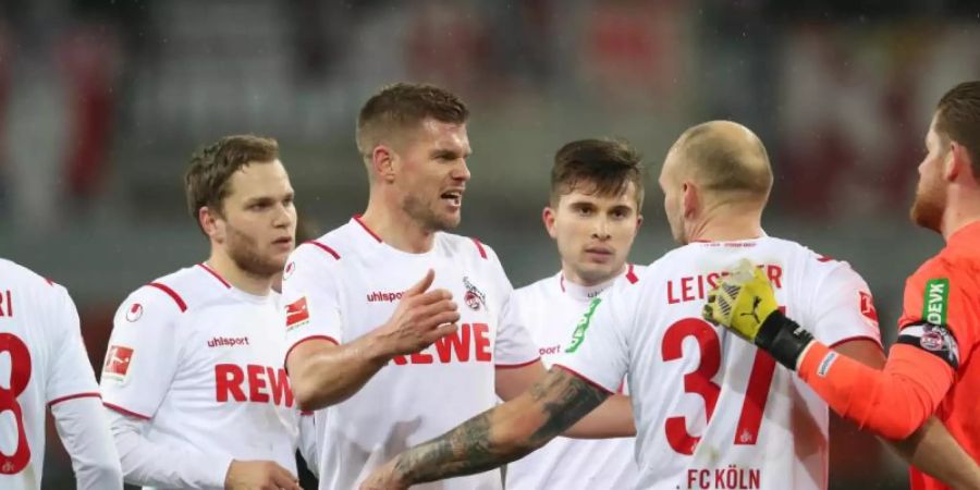 Die Spieler des 1. FC Köln können auch in Paderborn dreifach punkten. Foto: Friso Gentsch/dpa