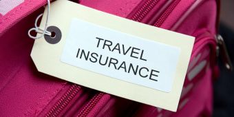 Etikett mit der Aufschrift Travel Insurance