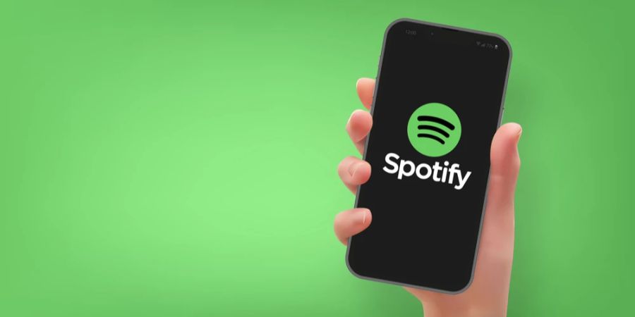 Smartphone Logo Spotify grüner Hintergrund