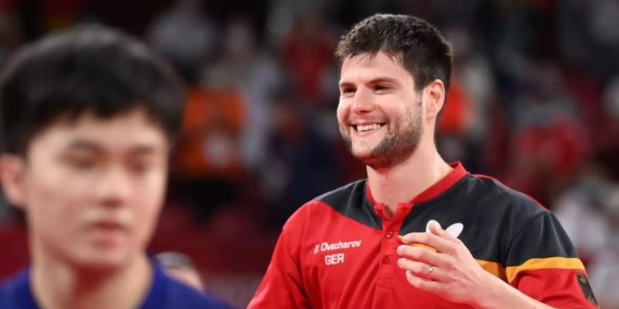 Strahlt über seine zweite Einzel-Medaille bei Olympia: Dimitrij Ovtcharov (r). Foto: Marijan Murat/dpa