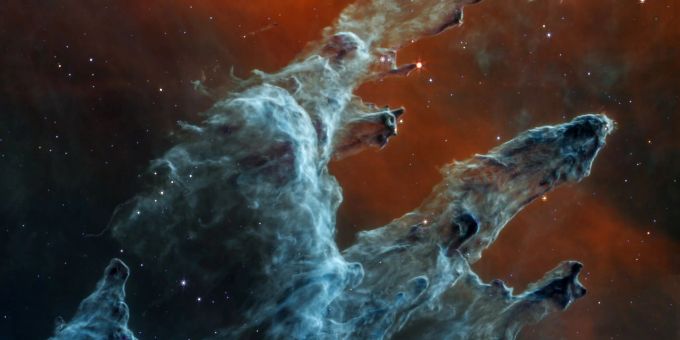 «Die Säulen der Schöpfung», aufgenommen vom James-Webb-Weltraumteleskop der NASA/ESA/CSA im mittleren Infrarotbereich. james-webb-weltraumteleskop