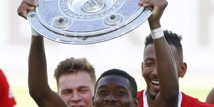 David Alaba wurde schon neun Mal mit dem FC Bayern München deutscher Meister. Foto: Kai Pfaffenbach/Reuters-Pool/dpa