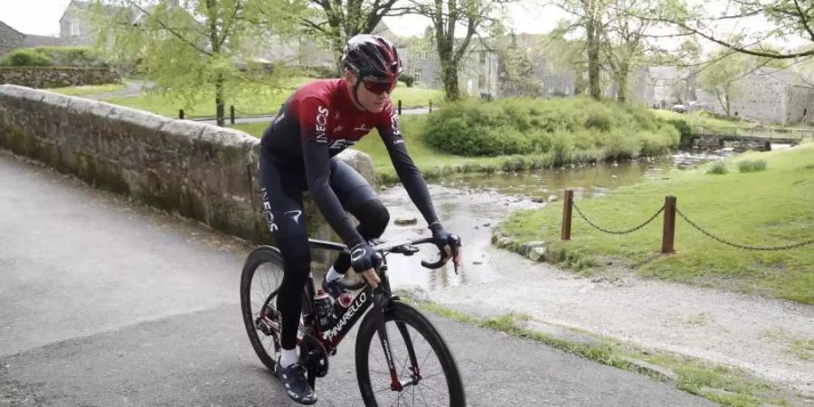 Chris Froome musste das Critérium du Dauphiné nach einem Trainingssturz aufgeben. Foto: Martin Rickett/PA Wire