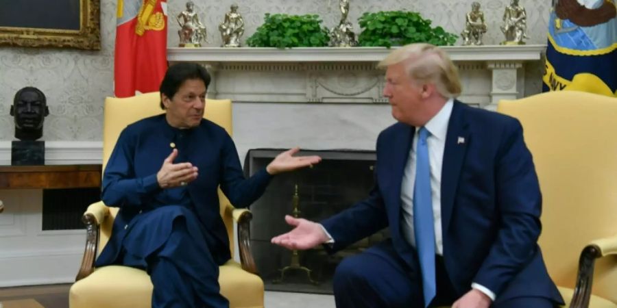 Khan (l.) mit Trump