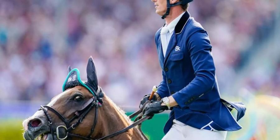 Zwischen Deutschland und Belgien hin- und hergerissen: Springreiter Daniel Deusser. Foto: Uwe Anspach