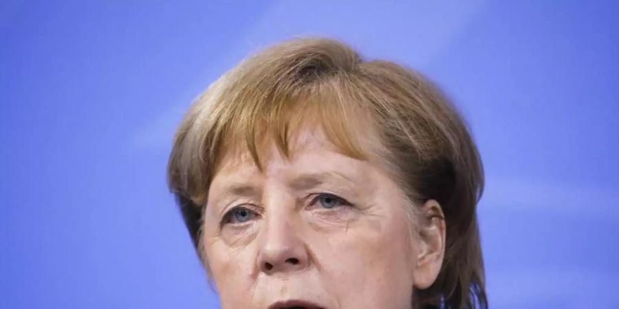 «Wir stellen uns denen, die versuchen, Deutschland zu spalten, mit aller Kraft und Entschlossenheit entgegen»: Angela Merkel. Foto: Markus Schreiber/AP/dpa