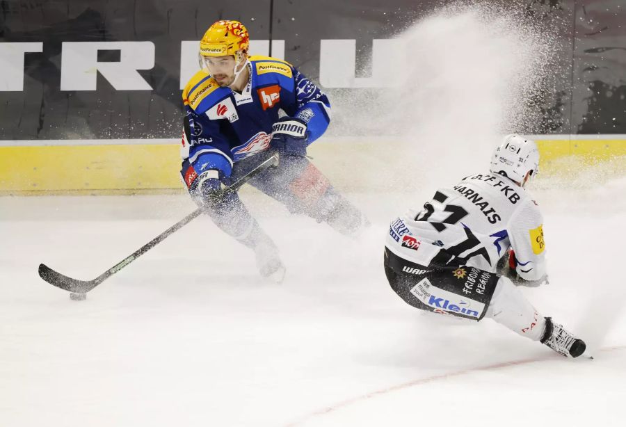 ZSC-Topskorer Denis Malgin (l.) im Duell mit David Desharnais von Fribourg-Gottéron.