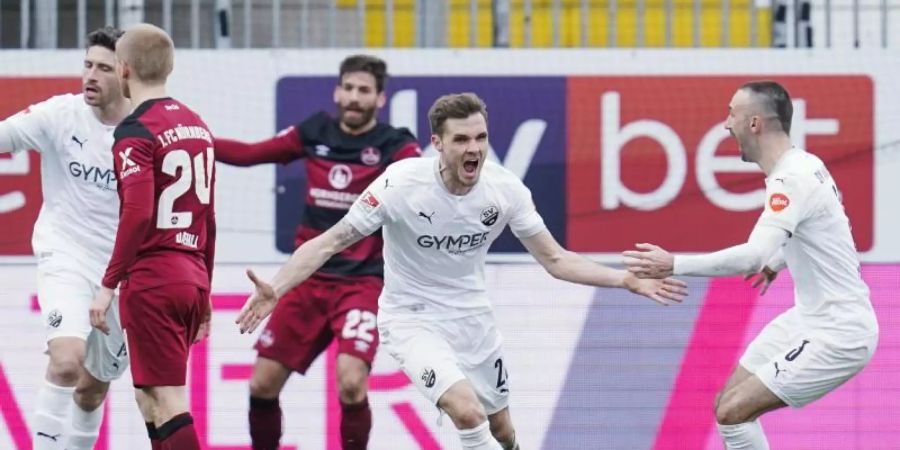 Nils Röseler (M) ebnete Sandhausen mit seinem Tor den Weg zum Heimsieg gegen Nürnberg. Foto: Uwe Anspach/dpa