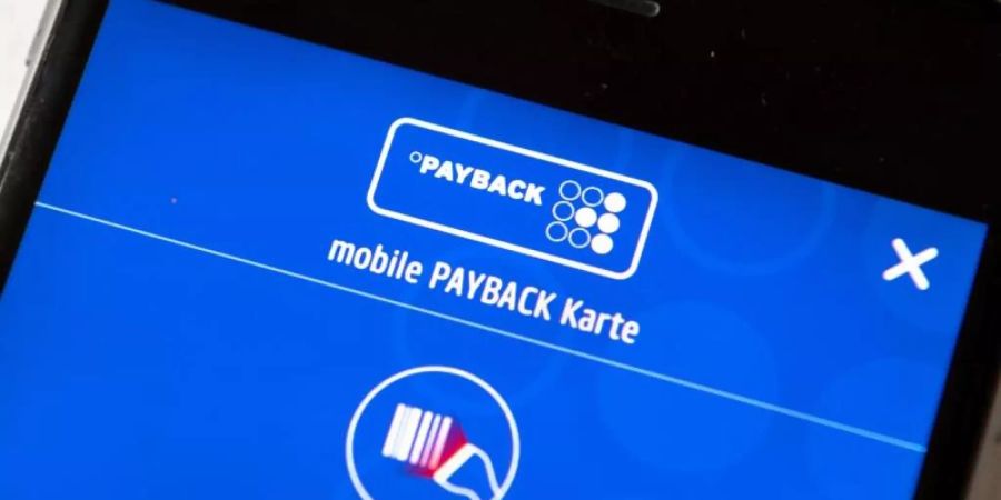 Die Payback-App auf einem Smartphone. Foto: Sina Schuldt/dpa